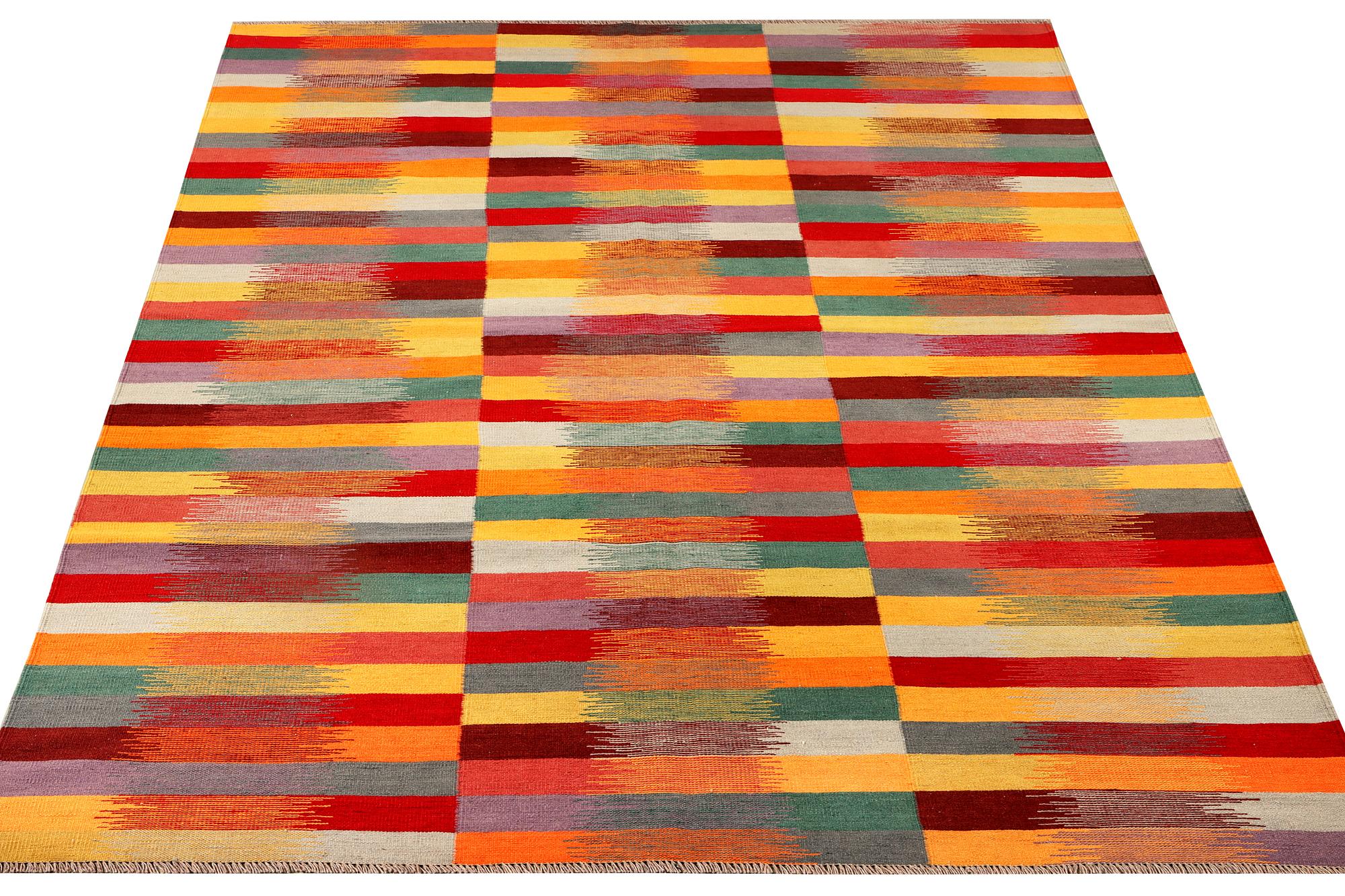 A Kilim carpet, c. 295 x 203 cm.