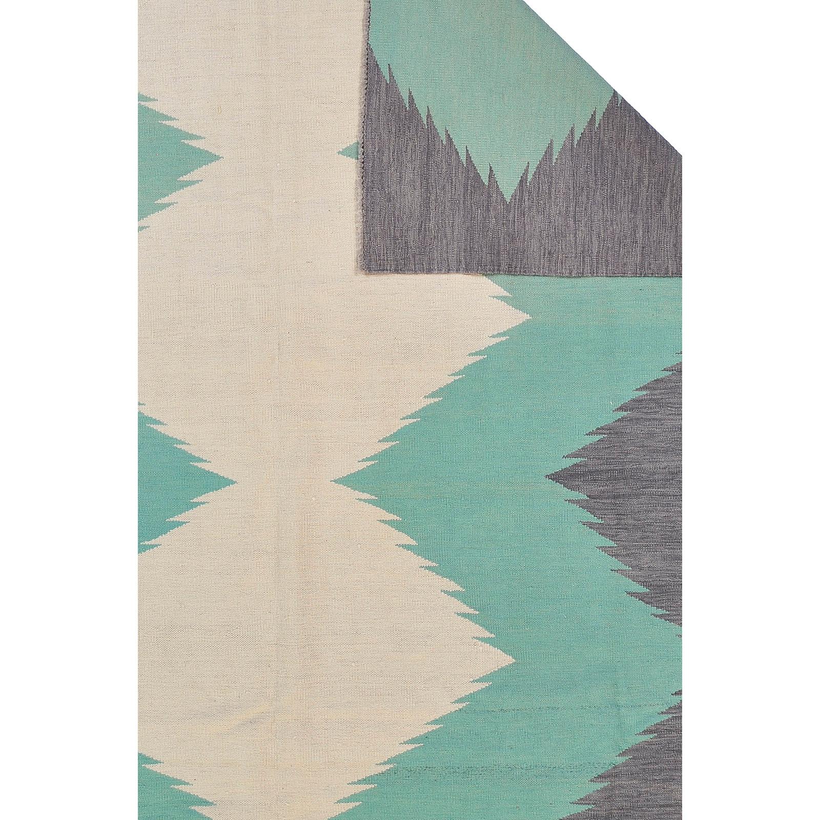 A kilim carpet, ca 303 x 250 cm.