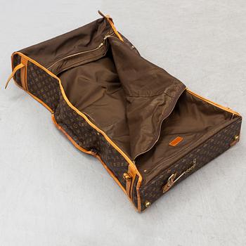 LOUIS VUITTON, a monogram canvas garment bag.