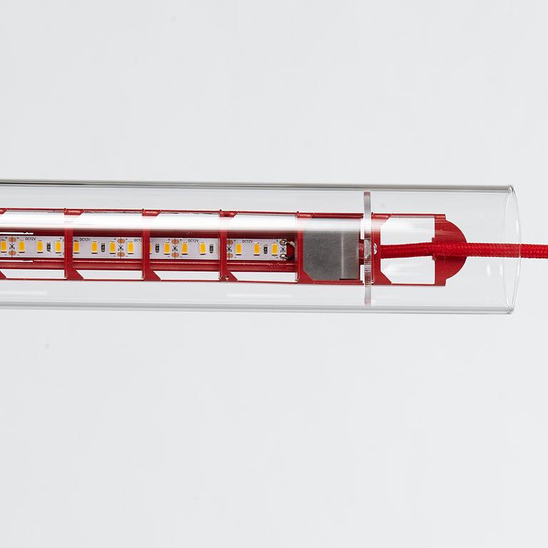 Sebastian Hepting, a 'Tubular Red Diffusor Red Cable' ceiling lamp, Ingo Maurer, Germany.