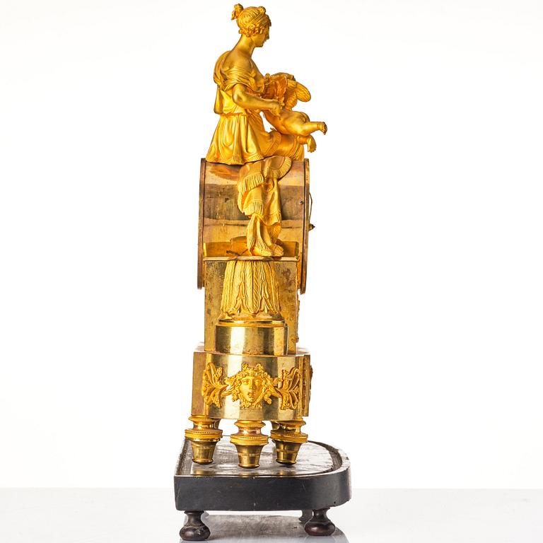 A French Empire 19th century gilt bronze mantel clock.