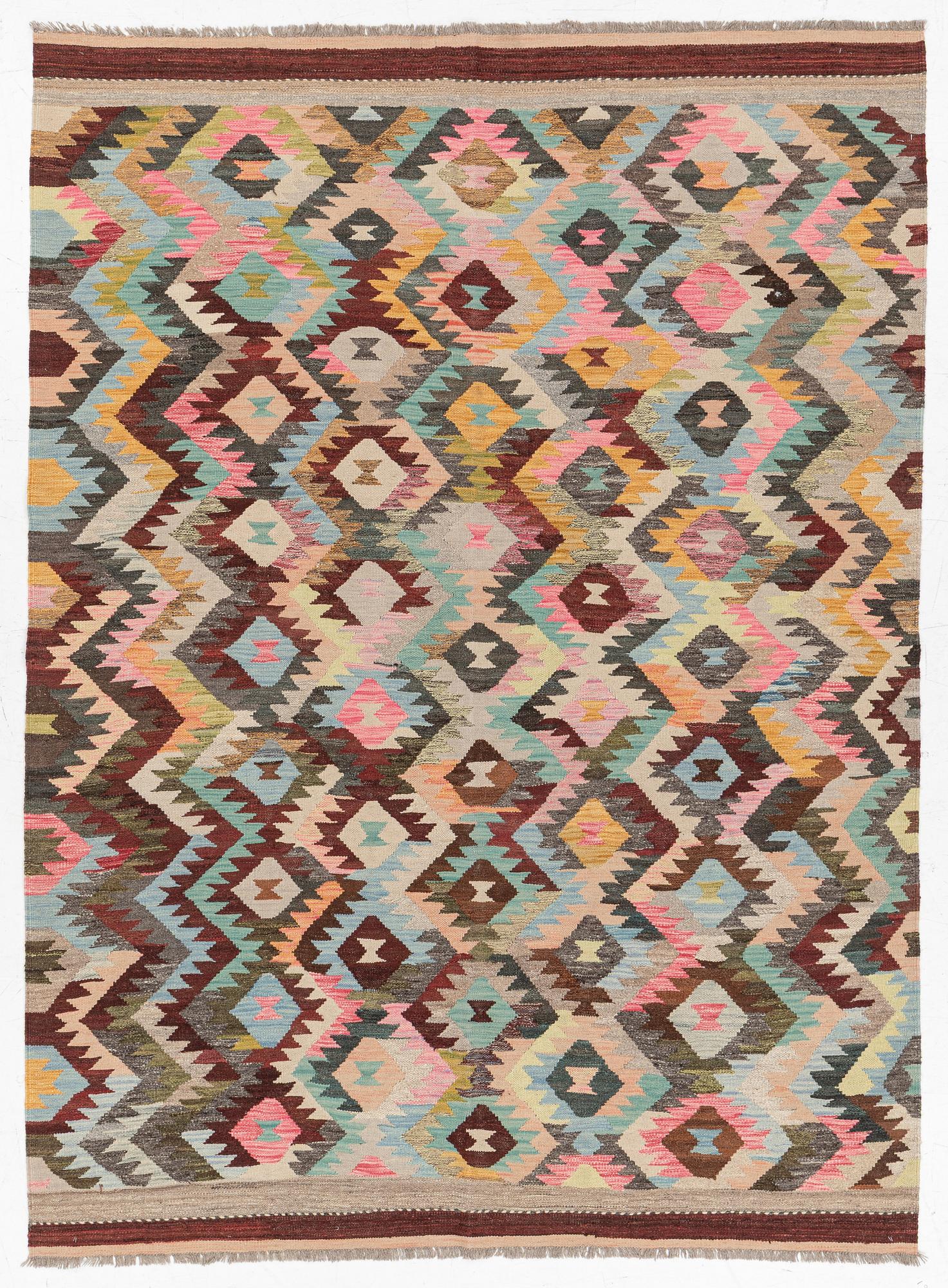 A Kelim carpet, c. 240 x 178 cm.