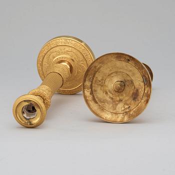 A pair of Empire candlesticks.
