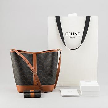 Céline, a canvas and leather handbag and wallet, 2020.