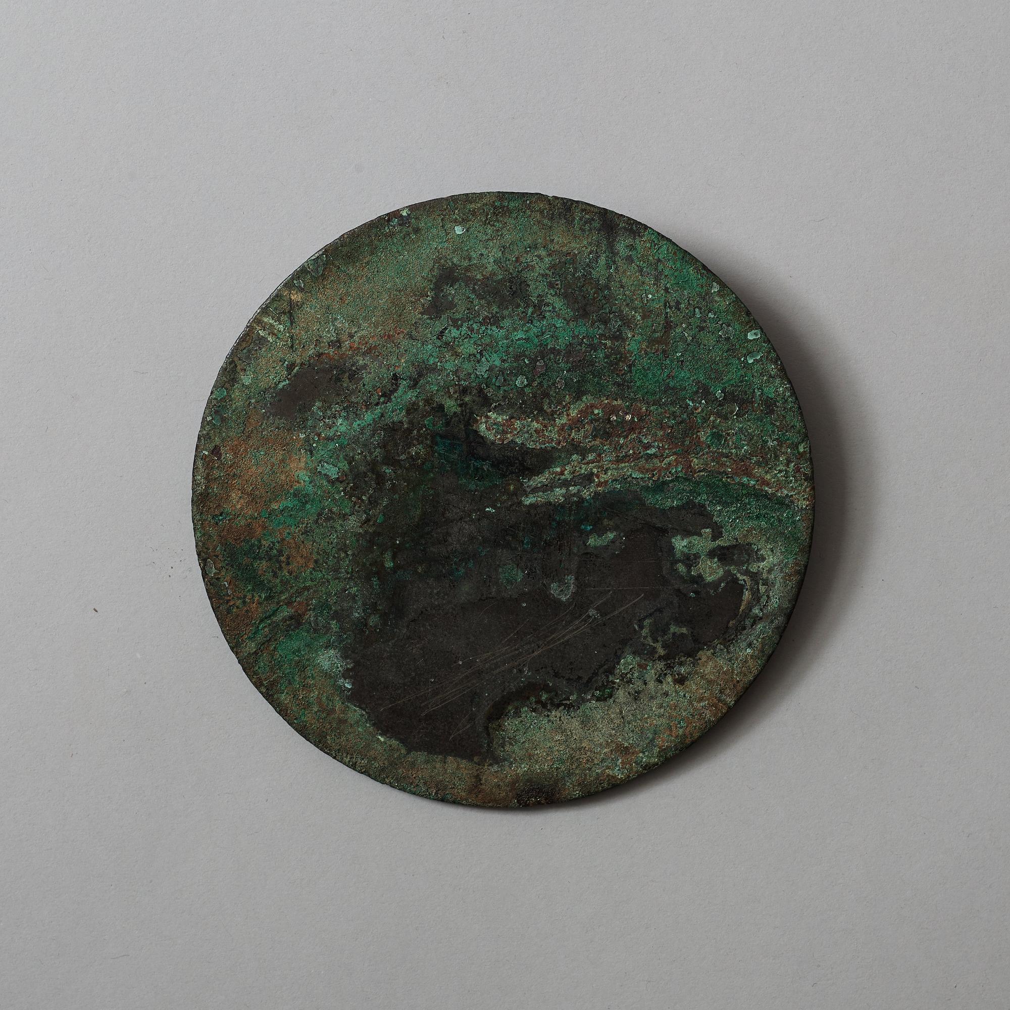 Two bronze mirrors, Han dynasty (206 BC -220 AD).