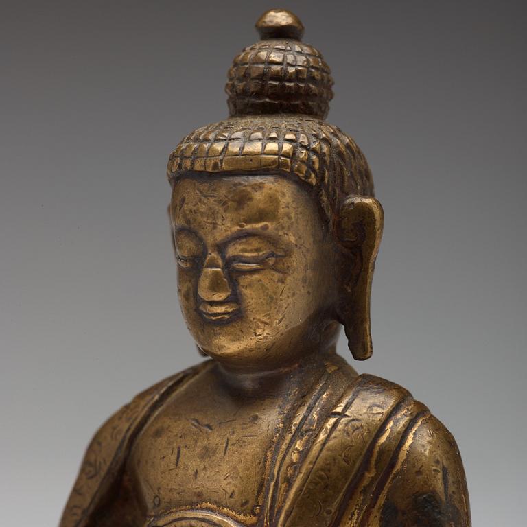 Two copper alloy figures of buddha, Sino-Tibetan, circa 1900.