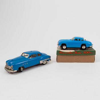 Two tinplate cars by Schuco and Kato Sairen German and Japan 1950s.