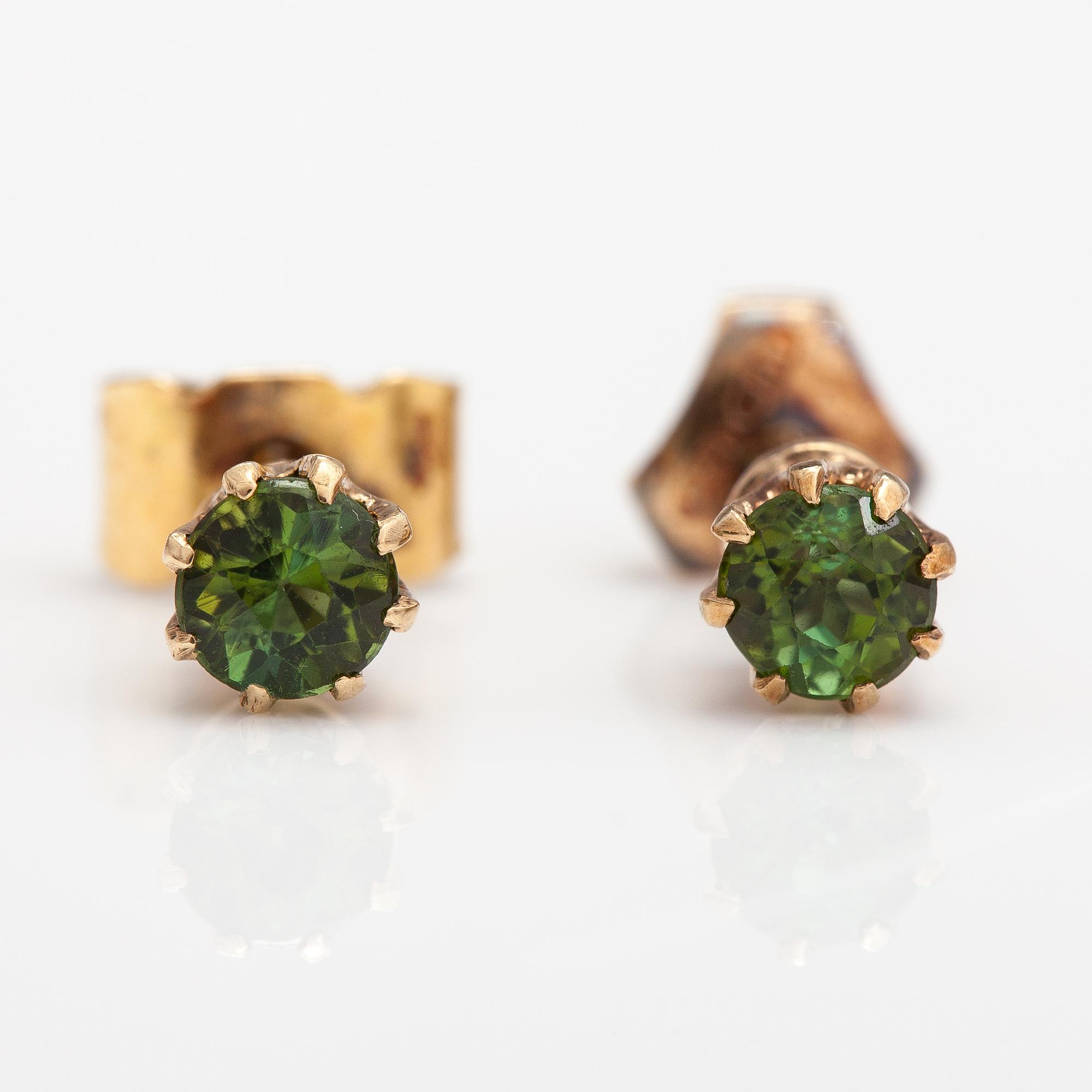 A pair of 14K gold earrings with tourmalines.