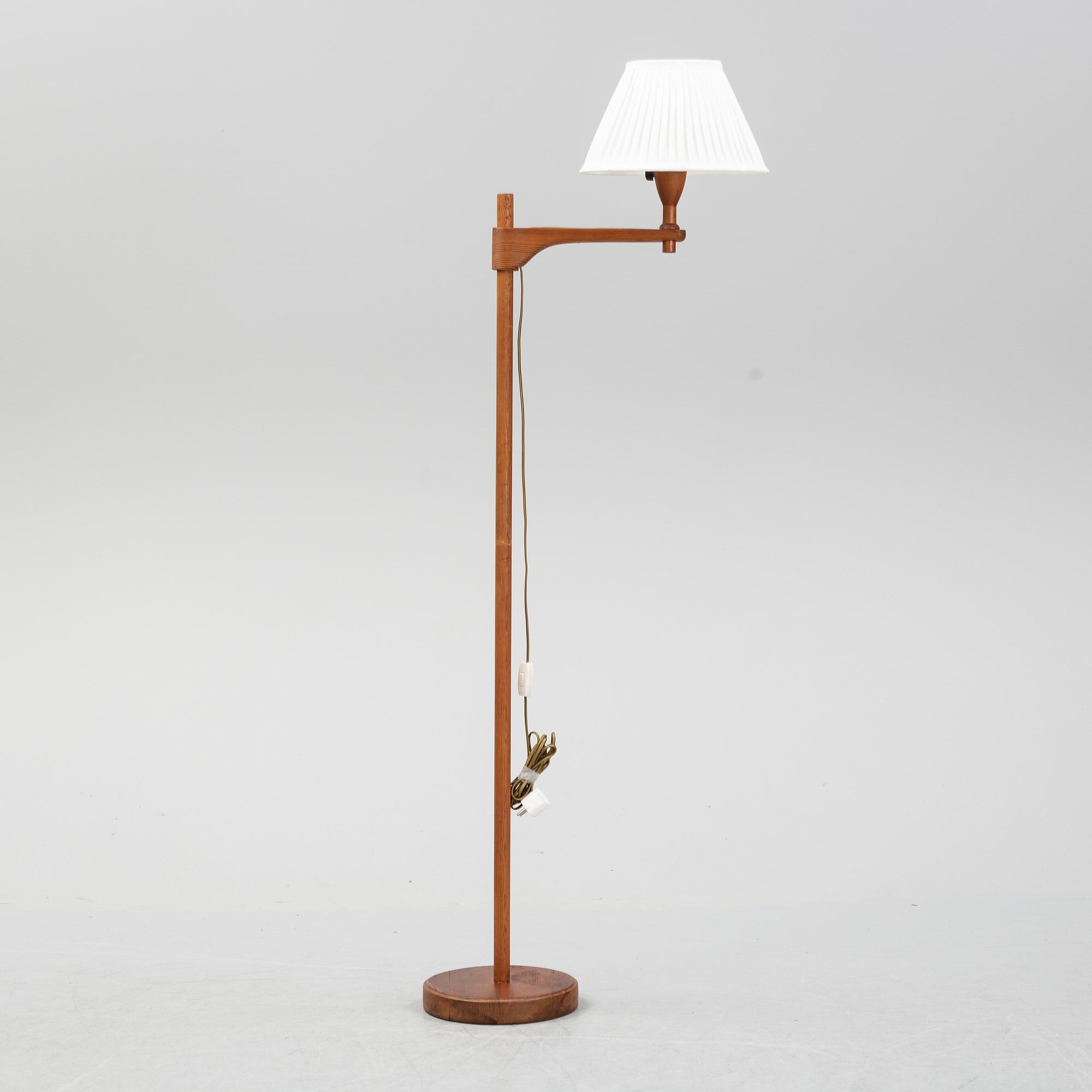 A late 20th century pine wood floor lamp design Carl Malmsten, Sweden.