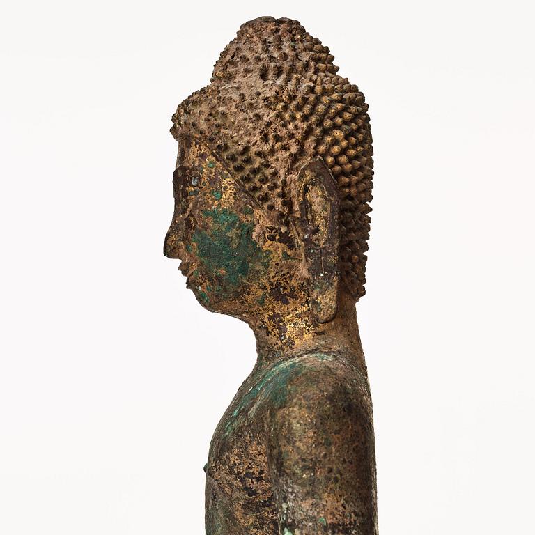 A standing figure of Buddha, Thailand, 18th Century.
