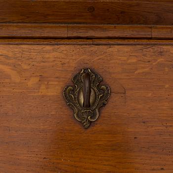 A mid 18th century composite rococo cabinet.