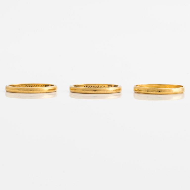 Ringar, 3 st, släta, 23K guld.
