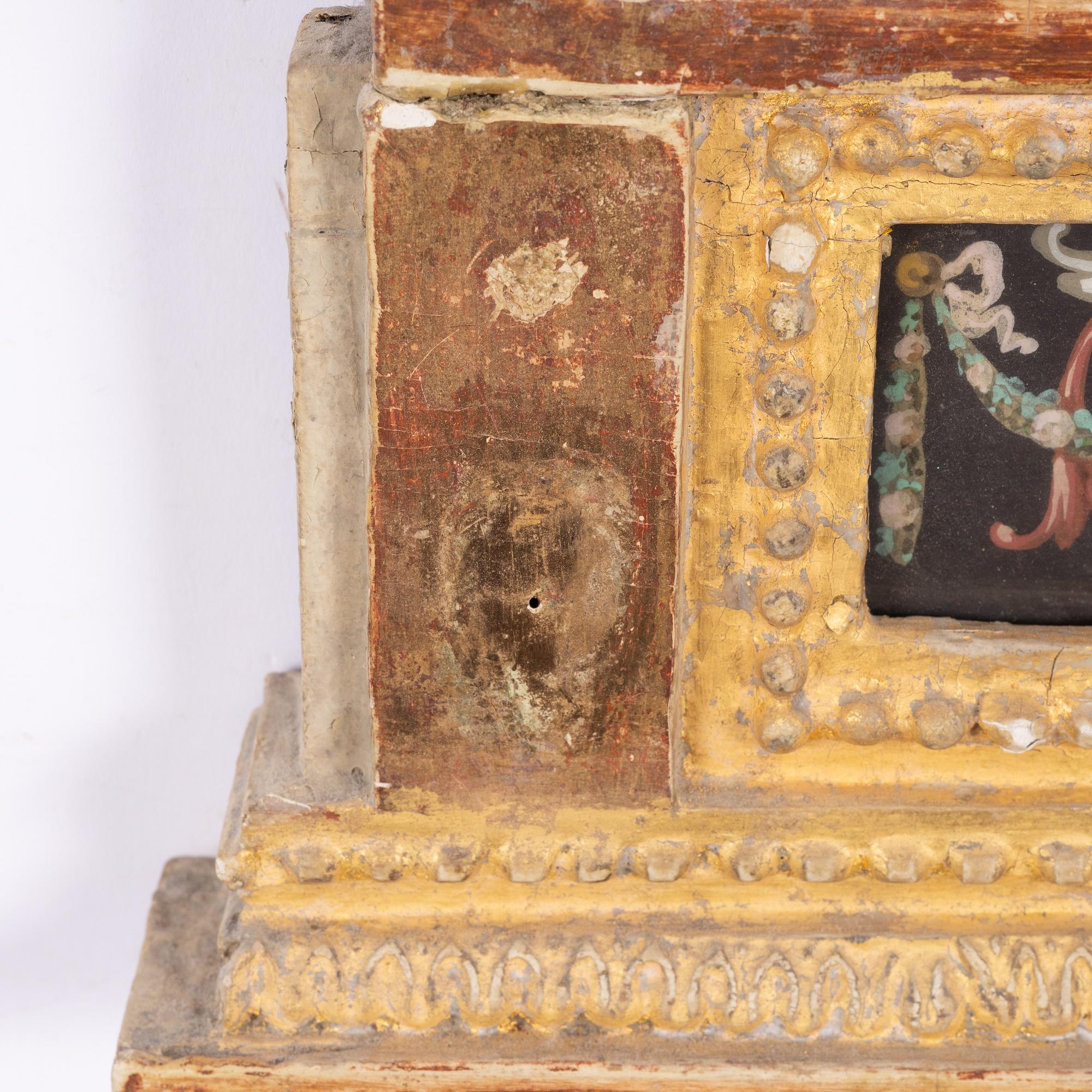 A late Gustavian mirror, circa 1800.