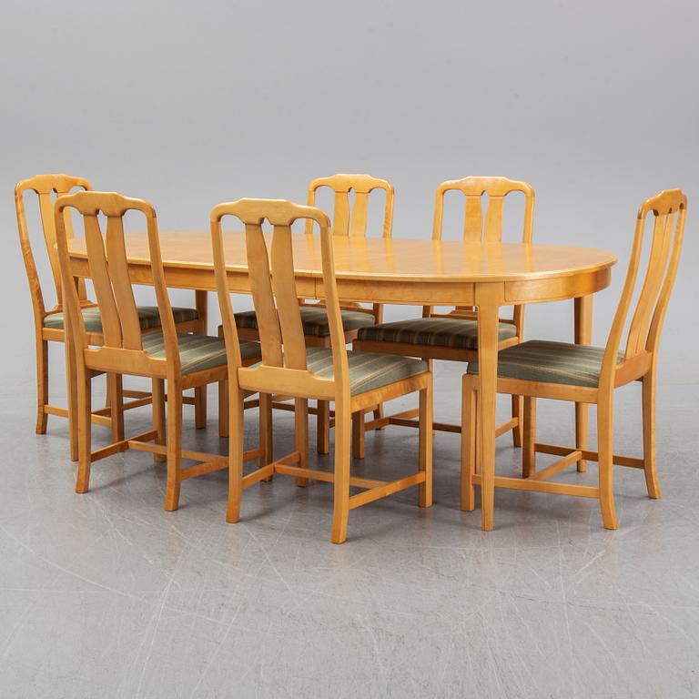 Carl Malmsten, a set of six 'Ambassadör' chairs and a 'Herrgården' dining table, second half of the 20th Century.