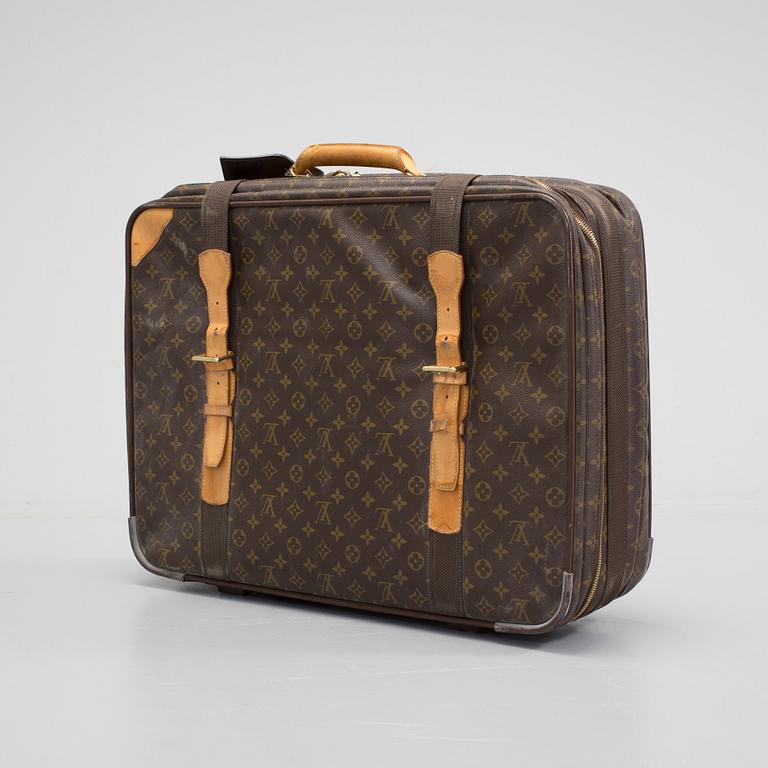 LOUIS VUITTON, a mongram canvas suitcase.