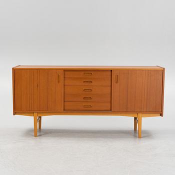 A 1950's/60's teak veneered sideboard.