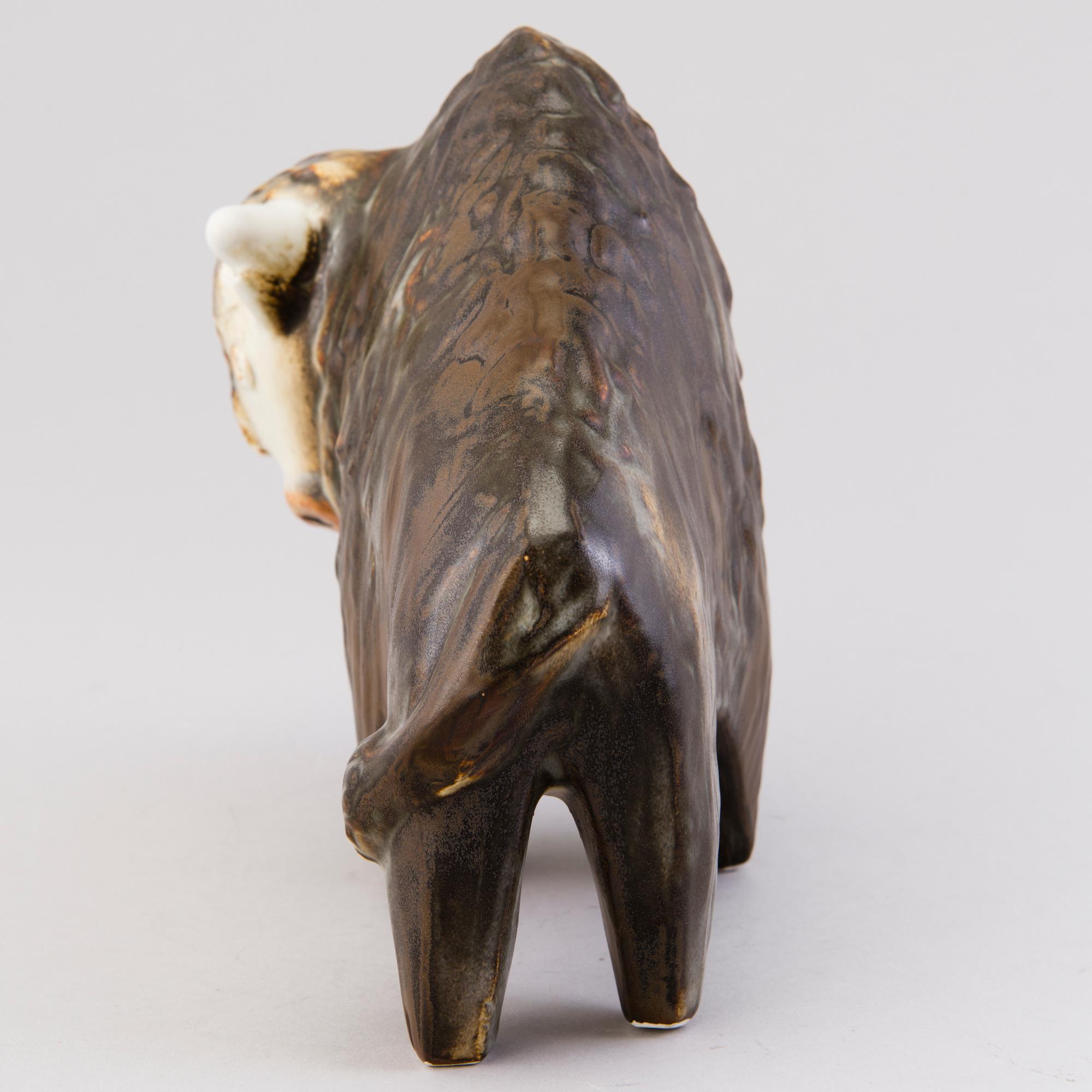 A Ceramic Figurine, signed T Kaasinen Arabia Finland.