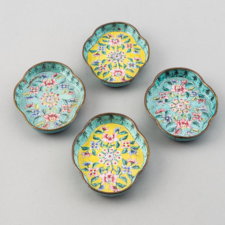 A set of 23 enamel on copper dishes, China, early 20th Century.