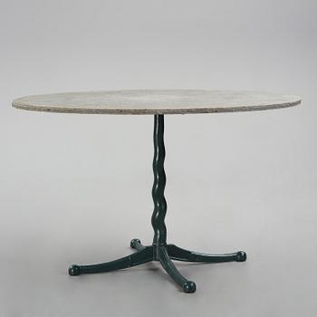 Josef Frank, attributed to, a cast iron table with granite top, Firma Svenskt Tenn, Sweden, 1930s-40s.