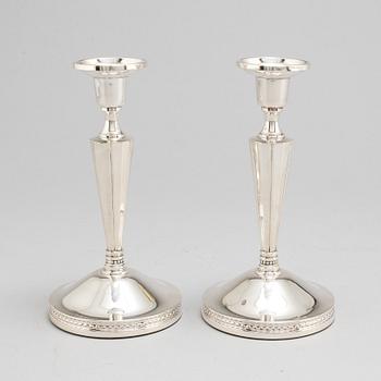 ERIC LÖFMAN, a pair of silver candle sticks, Uppsala 1972.