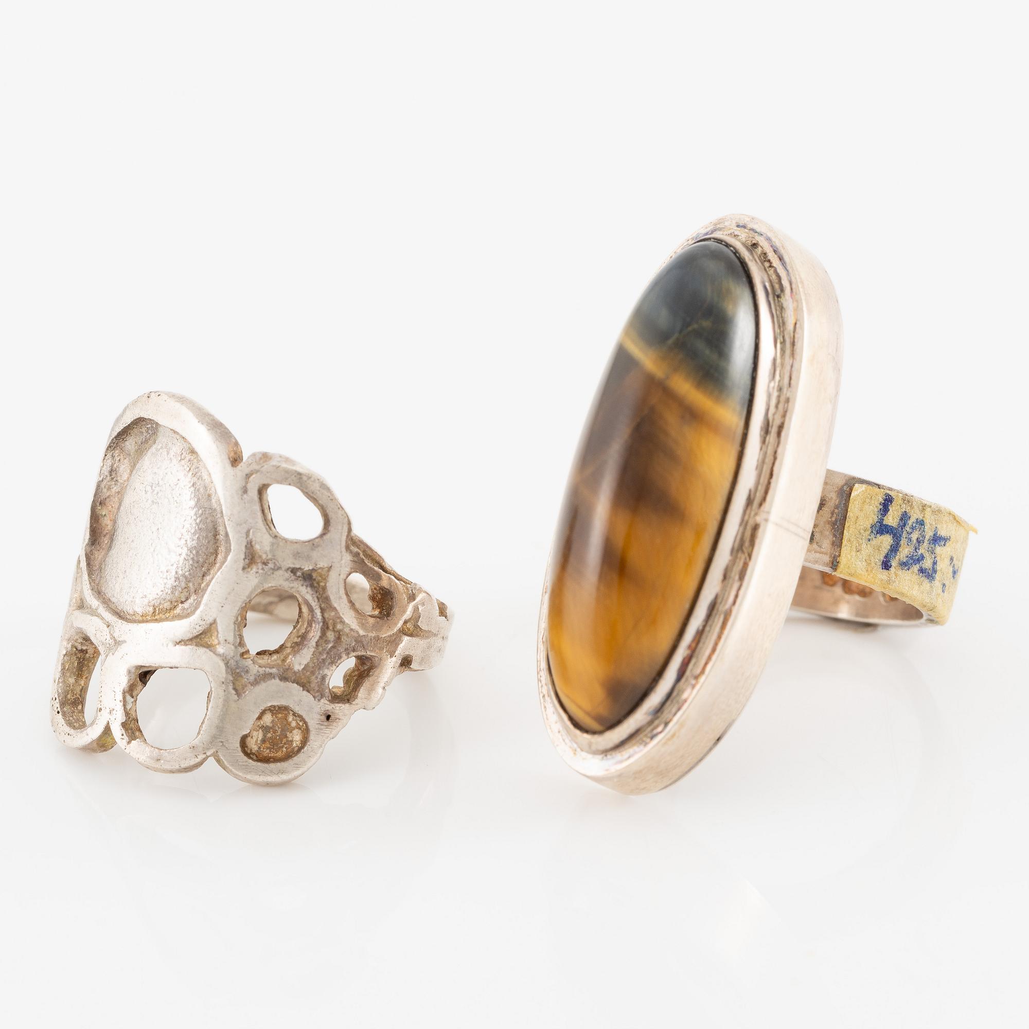 Lars Arby, fyra ringar, silver, en med tigeröga.