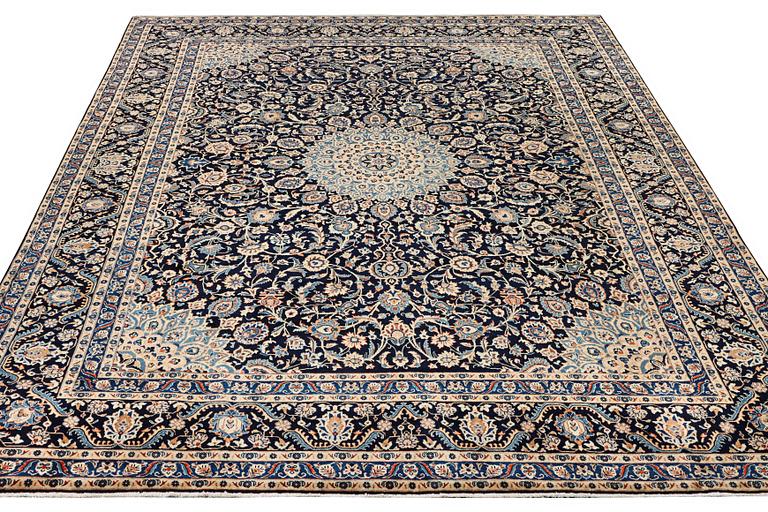 A Keshan carpet, c. 392 x 290 cm.