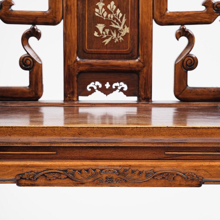 A pair of hardwood armchairs, late Qing dynasty.