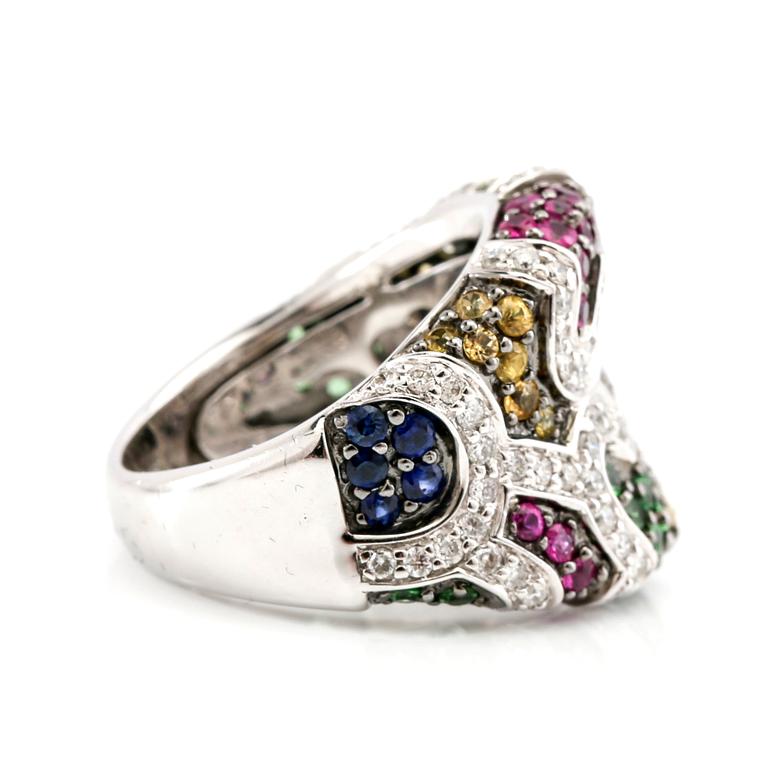 Ring in 18K white gold with round brilliant-cut diamonds and faceted coloured stones.