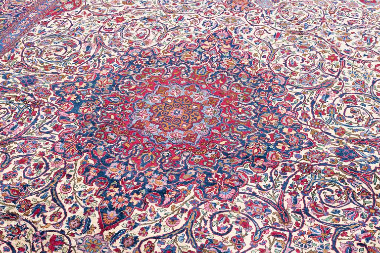 An antique silk Kashan carpet, central Persia (Iran) c. 378 x 259 cm.