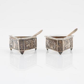 A group of six silversalt cellars with spoons, bearing Swedish import marks, G.A. Dahlgren, Malmö, 1920.