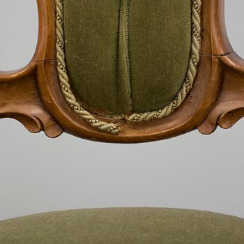 A set of seven late 1800s chairs.