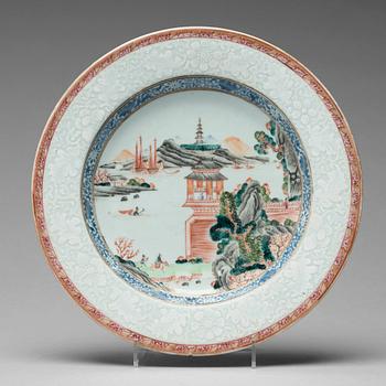 A set of 11 famille rose dinner plates, Qing dynasty, Qianlong (1736-95).