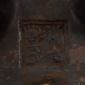 A copper alloy tripod censer, Ming dynasty, 17th Century with Xuandes four character mark.