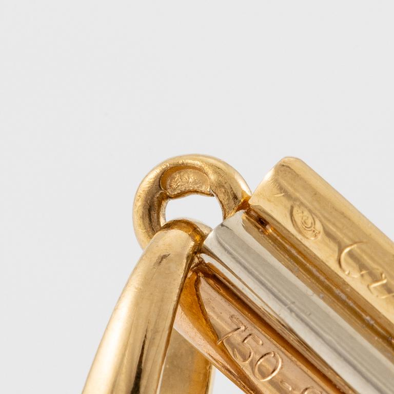 A Cartier necklace 18K multi-coloured gold "Trinity" cross.