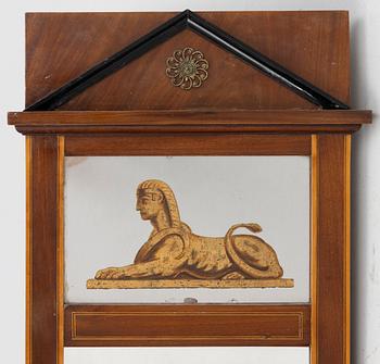 An Empire style mirror, second half of the 20th century.
