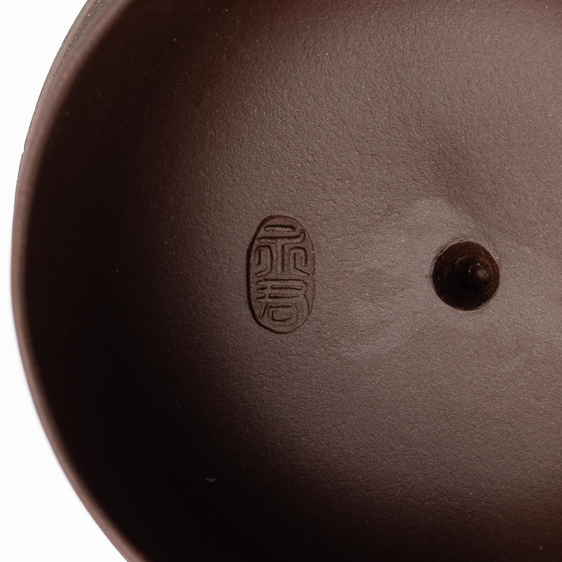 A group of three Chinese yixing teapots, 1960-80s.