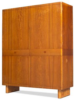 734. An Axel-Einar Hjorth ashe wood cabinet "Birka" by Nordiska Kompaniet, Sweden 1930's.