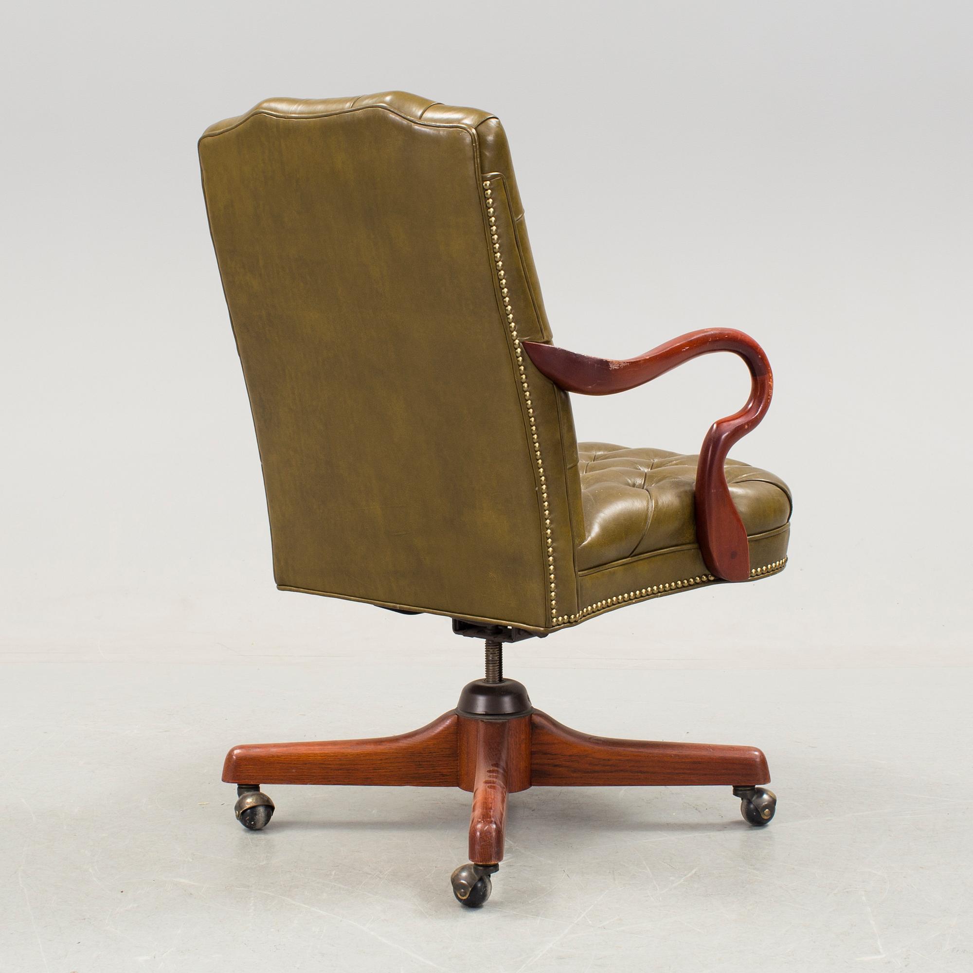 A Chesterfield style sweivel chair, Alex Stuart Design Inc, Chatsworth ...