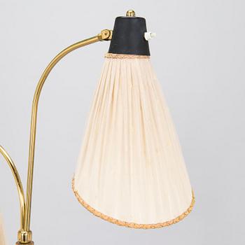 A mid-20th century floor light.