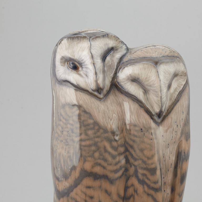 A Royal Copenhagen porcelain figure of two owls, Denmark, 20th Century.