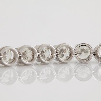 An 18K white gold bracelet set with round brilliant-cut diamonds with a total weight of ca 12.00 cts.