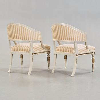 A pair of late Gustavian circa 1800 armchairs.