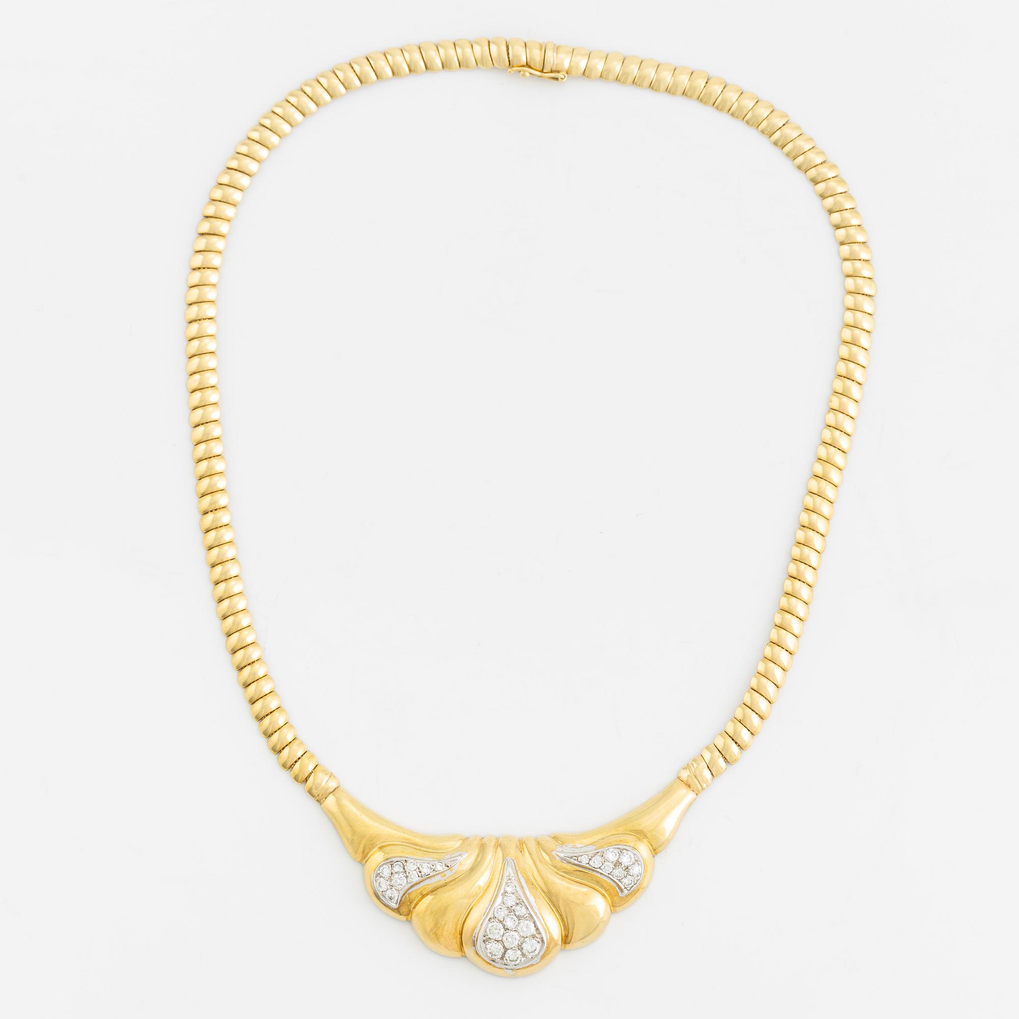An 18K gold necklace set with round brilliant-cut diamonds.