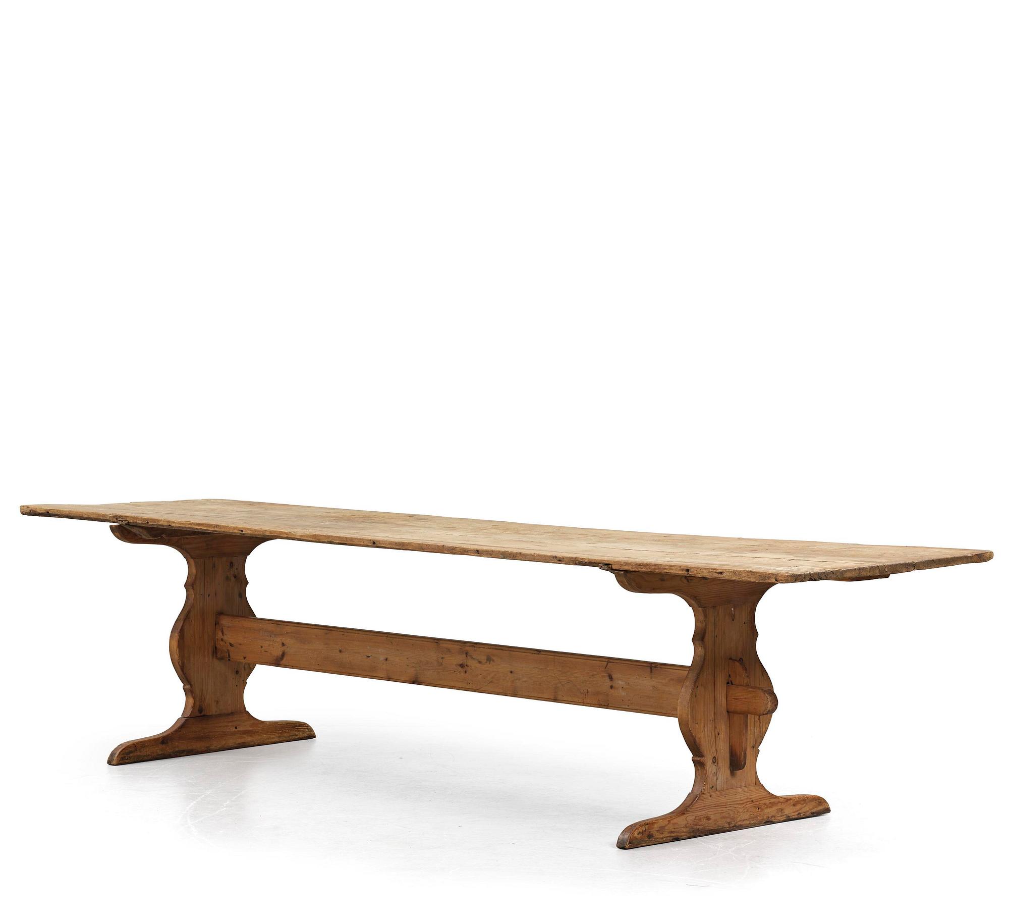 A pine trestle table, 20th century incorporating older elements.