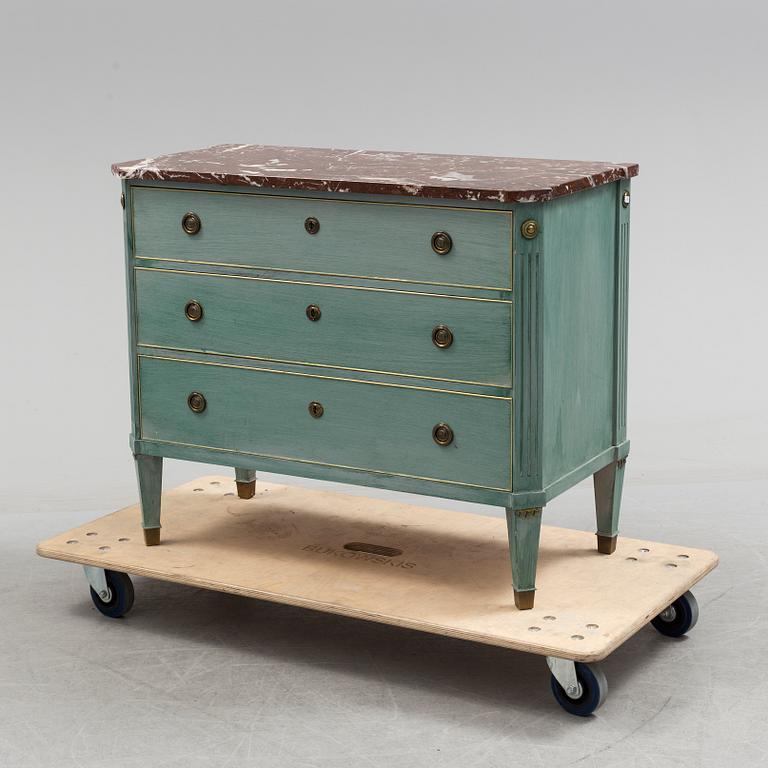 A Gustavian style schest of drawers, mid 20th century.