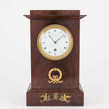 A French Empire mantel clock, signed 'Tarault à Paris', early 19th century.