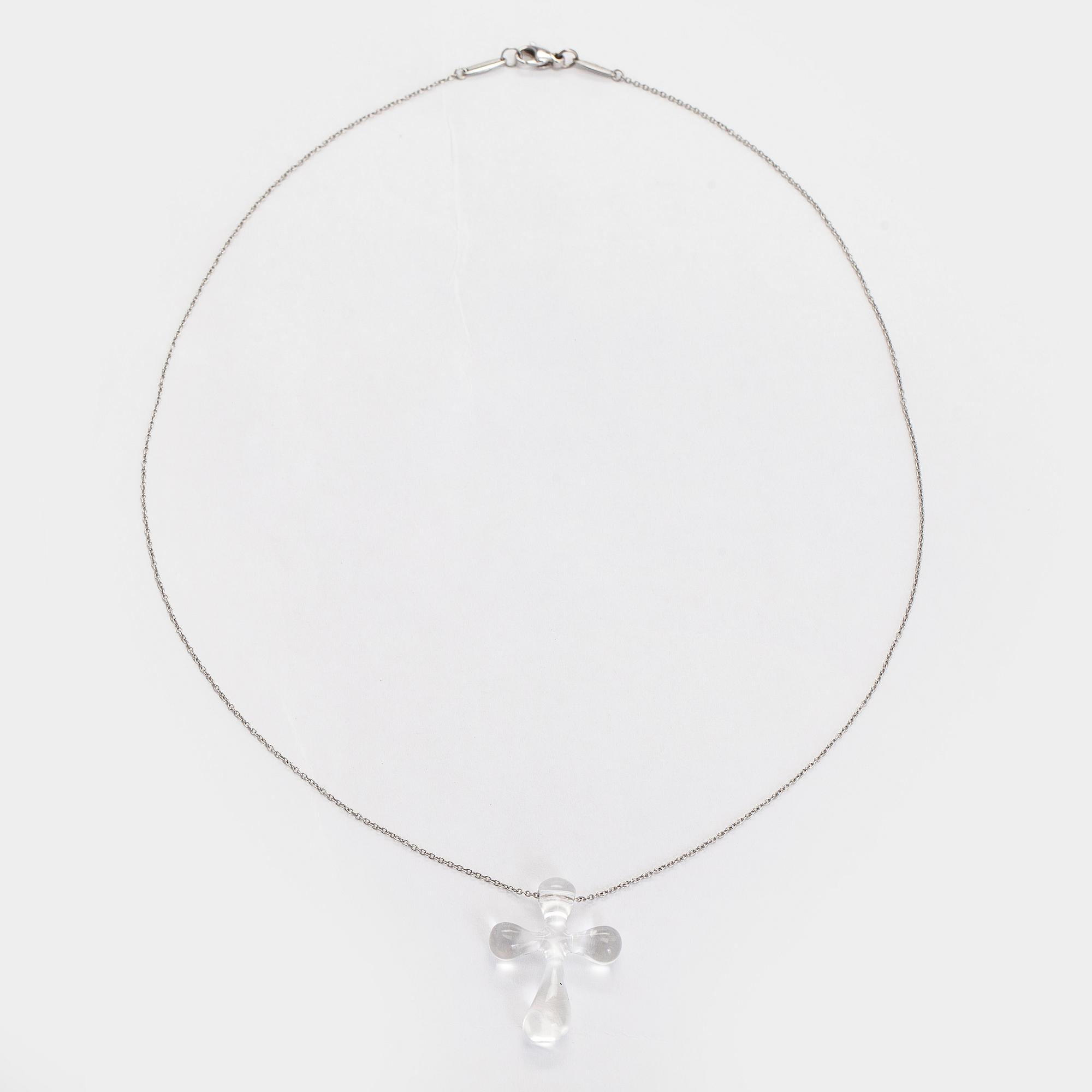 Tiffany & Co, Elsa Peretti, kaulakoru, risti, platinaa ja vuorikristallia.