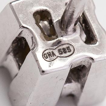 Korvakorupari, 14K valkokultaa sekä prinsesshiottuja timantteja yht n 0.08ct.