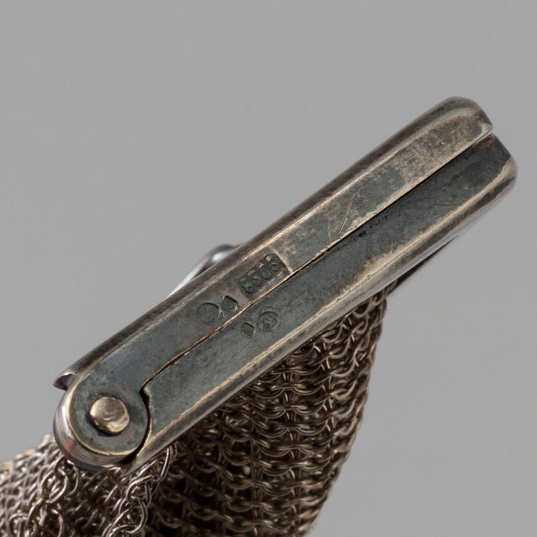 AFTONVÄSKA SAMT PORTMONNÄER, 3  stycken, silver, 1900-talets första hälft.