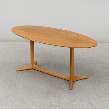 A 1959 'Plommonet' walnut coffee table by Kerstin Hörlin-Holmquist for Nordiska Kompaniet.